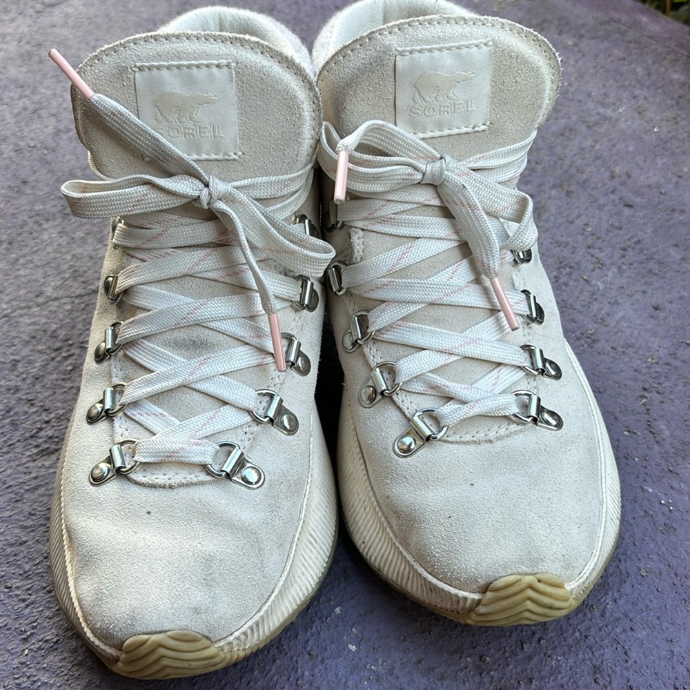 Sorel— off white high top sneakers